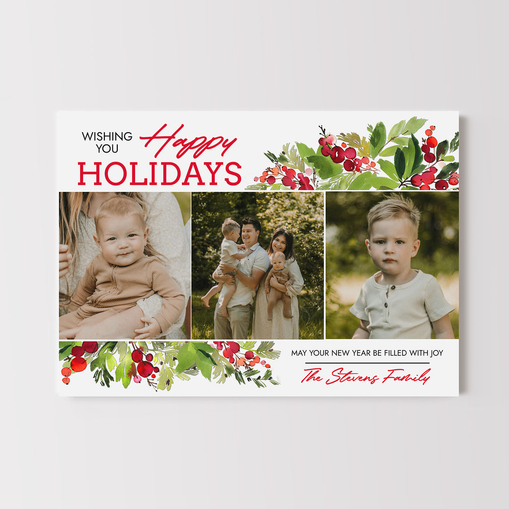 Holiday card with family photos and festive holly elements on a white background