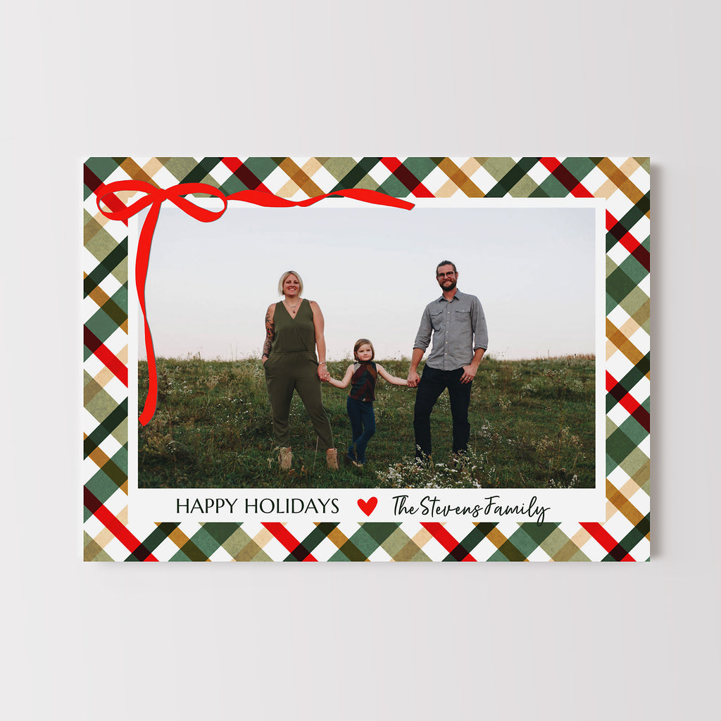 Holiday card with a family photo and plaid border on a white background