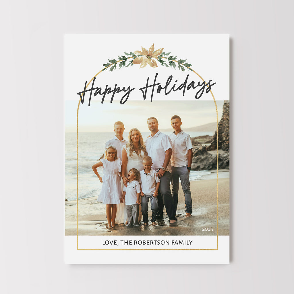 modern minimalist style holiday or christmas photo card with a single photo, gold arch frame and holiday greenery