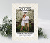 new year photo card in portrait format with cream background, patterned background and a single photo