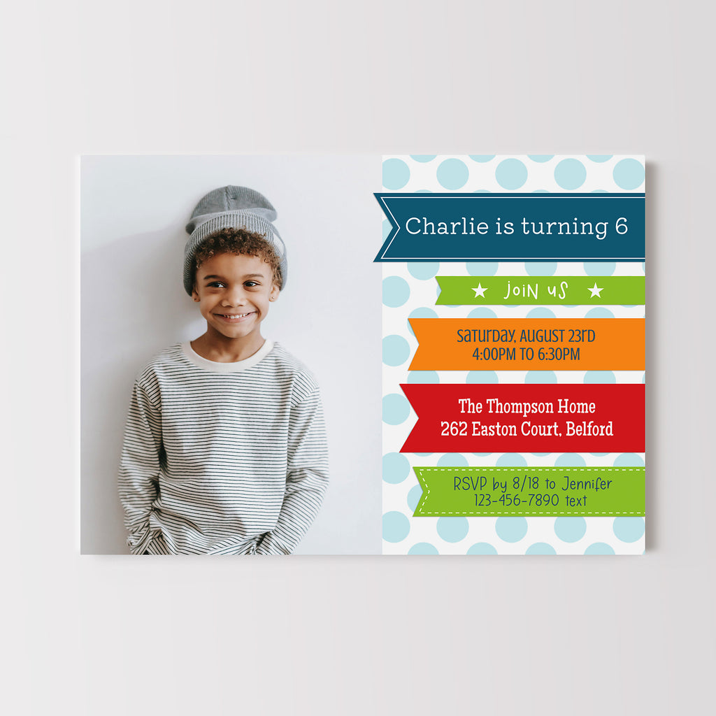 boys birthday invitation with a single photo on the left and colorful rainbow ribbons to display party details on the right