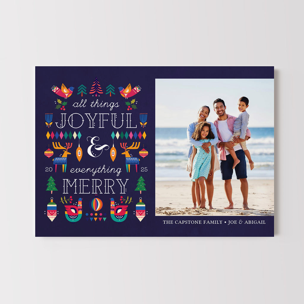 Christmas card template with a single photo and holiday message with colorful Scandinavian style holiday graphics.