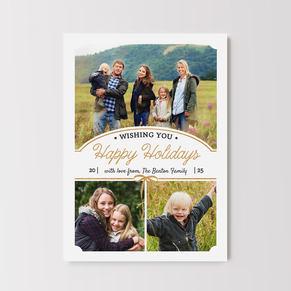 Simple holiday photo card template featuring 3 photos on a white background with an arched detail and gold bow.