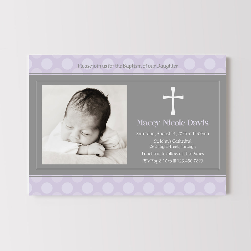 Baptism invitation with a photo of a baby and a cross on a light gray background and lavender polka dot pattern.