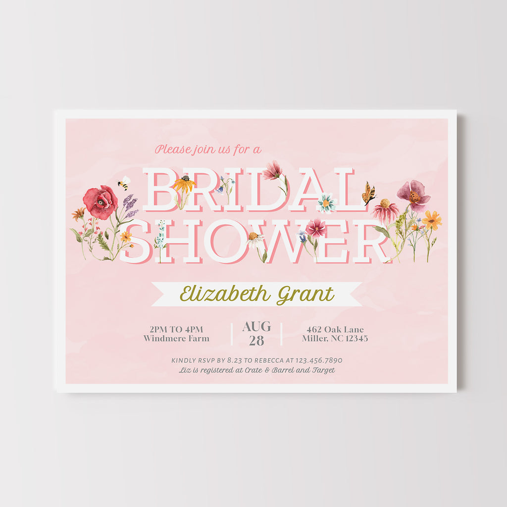 Wildflower themed bridal shower invitation with watercolor painted graphics and a light pink background. 